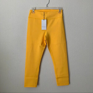 Revolve lovewave leggings size medium yellow high rise crop leggings